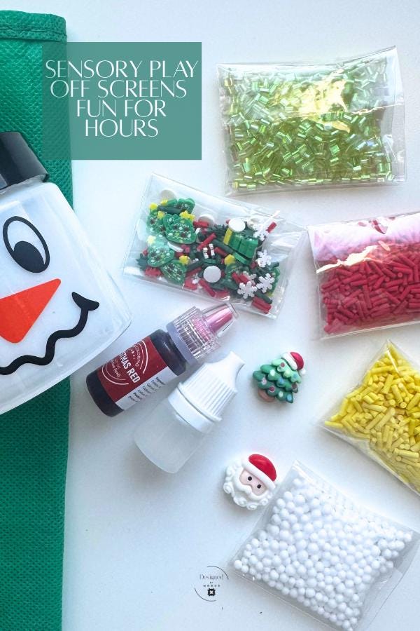 Flat lay of Christmas slime kit contents including snowman jar, activator, red dye, holiday charms, and sprinkles with the text โSensory Play Off Screens Fun for Hours.โ