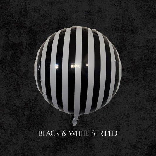 Black and white striped round balloon, Beetlejuice-inspired party balloon for Halloween decorations and balloon garlands.