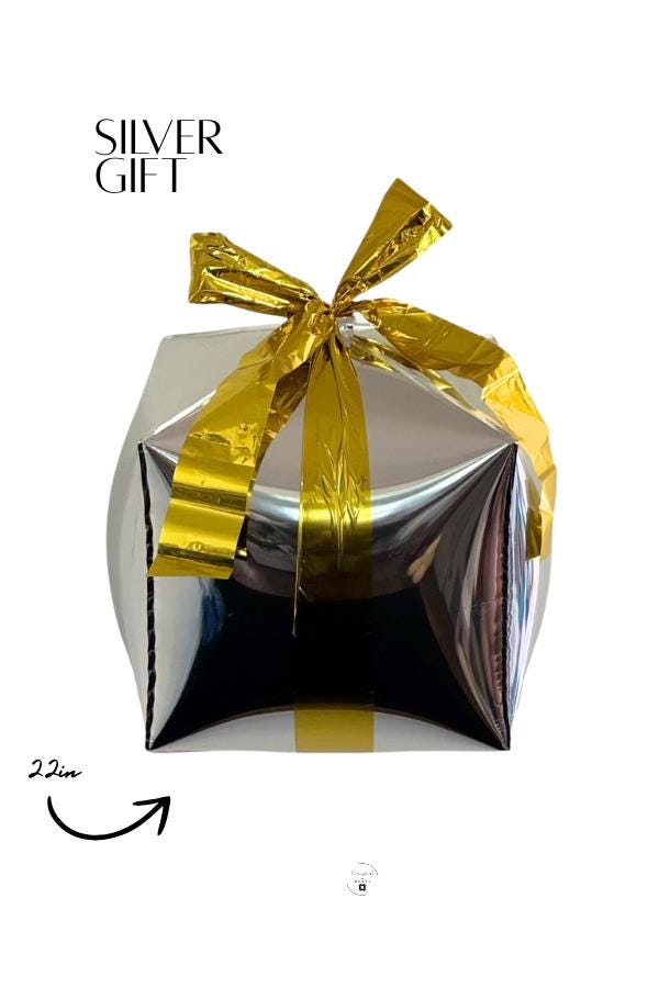 22-inch silver gift box mylar balloon with shiny gold bow, metallic holiday party decoration by Designed by Modus.