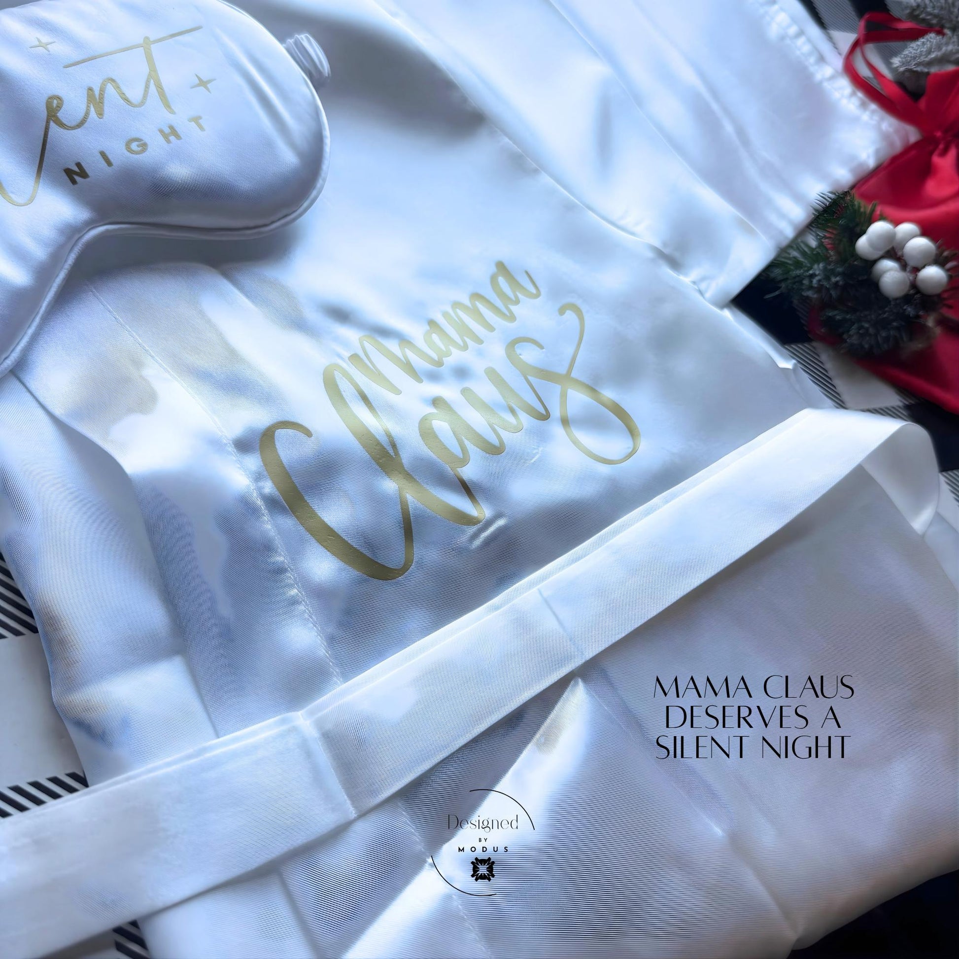 Mama Claus robe and matching sleep mask styled with red ribbon and greenery, labeled “Mama Claus Deserves a Silent Night.”