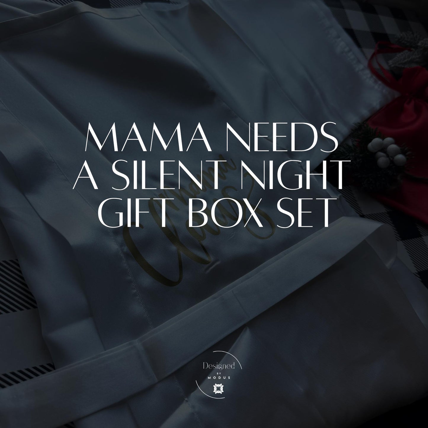 Flat lay of Mama Claus Silent Night Christmas gift box with silk robe, mug, eye mask, and spa accessories.