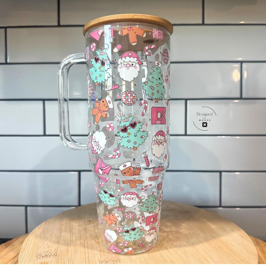 Side view of glass cup showing festive pink and green Christmas pattern