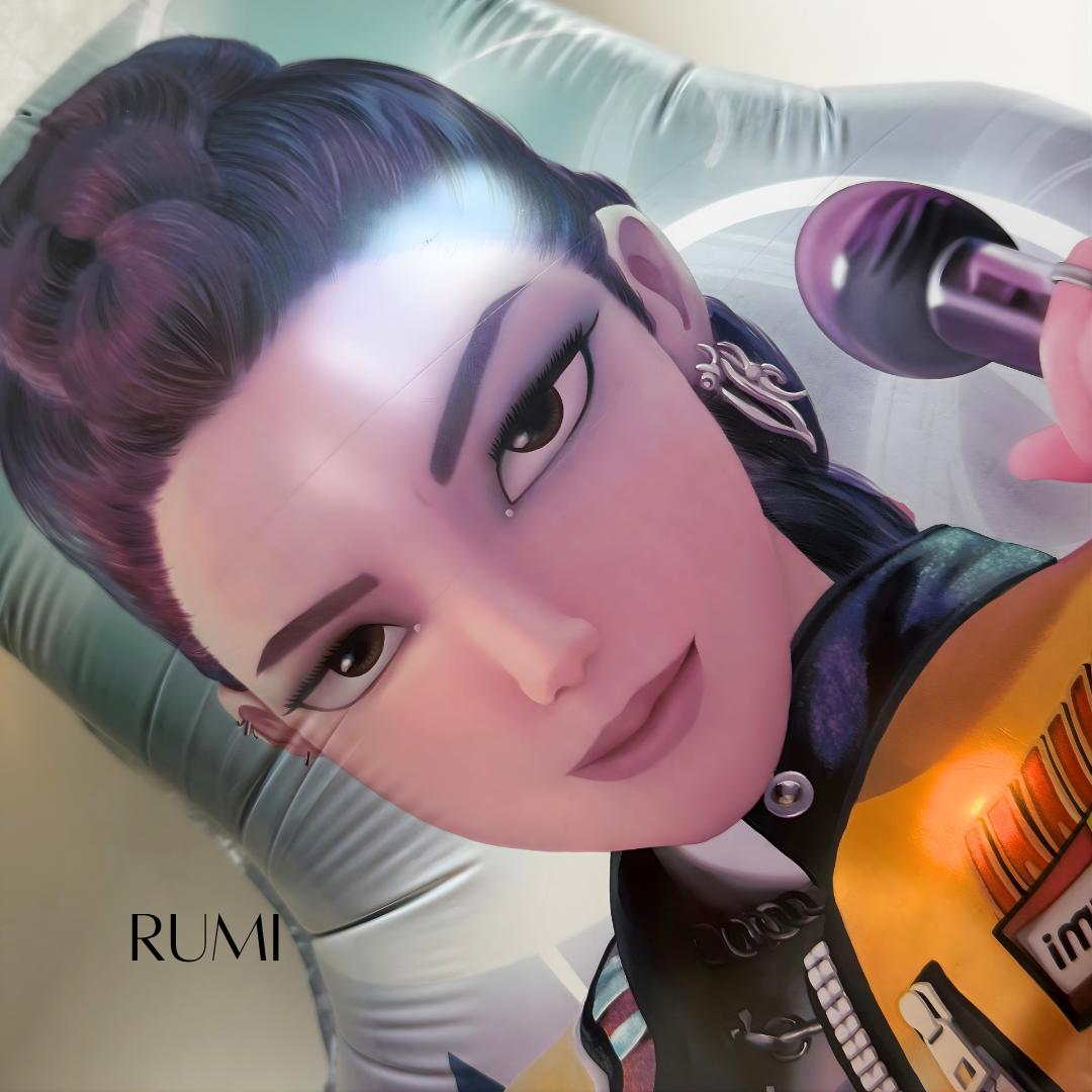 Close-up view of RUMI mylar balloon showing detailed anime-style artwork — Designed by Modus