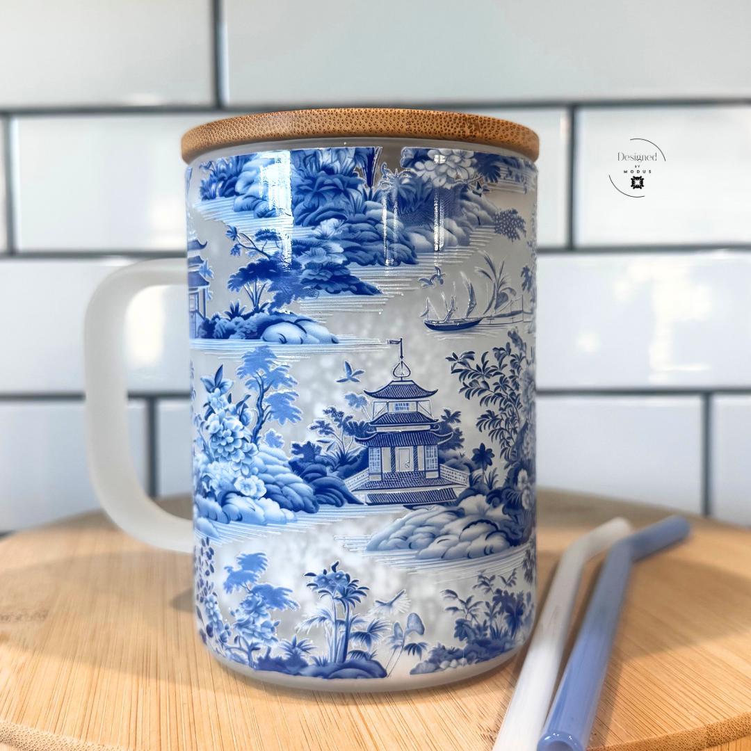Mug with bamboo lid and blue straw, showing full winter tea aesthetic.