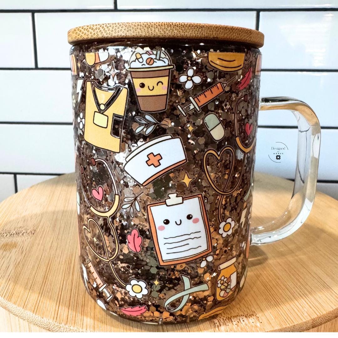 Side angle of sparkly cup with bamboo lid and clear handle.