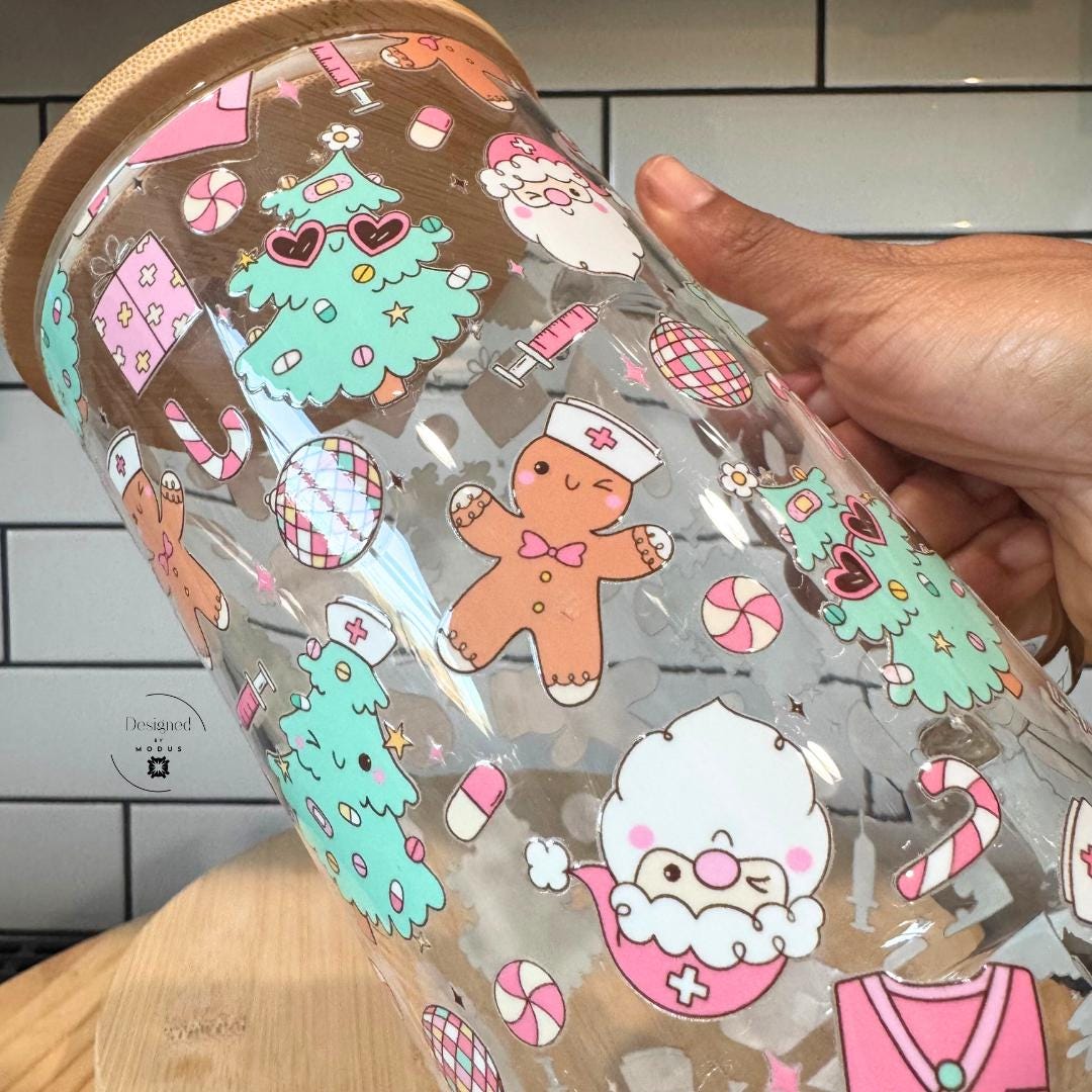 Close-up of pastel holiday print with gingerbread and disco-ball ornaments