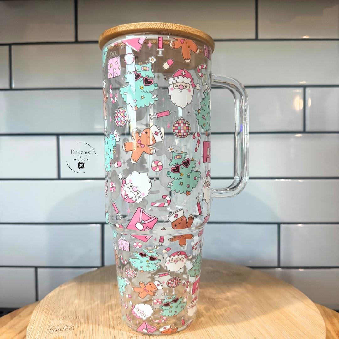 Full view of handled tumbler with Santa and candy cane illustrations