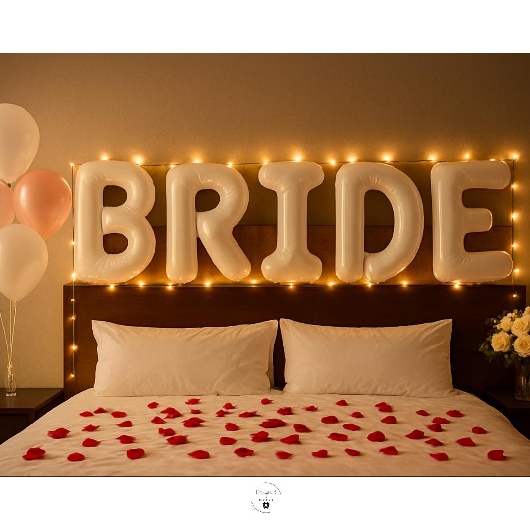 White BRIDE letter balloons with floral backdrop and pink balloons