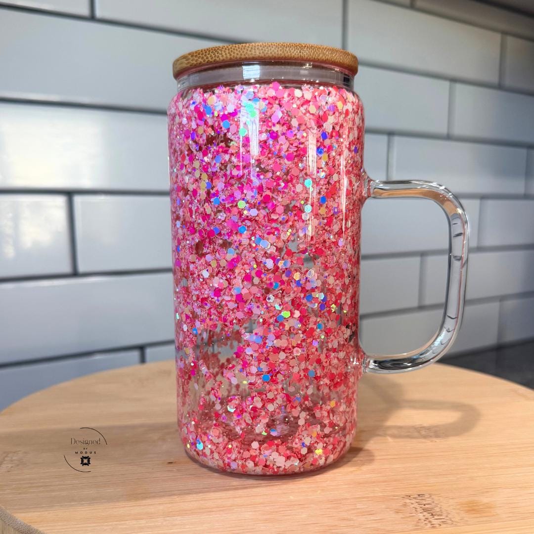 Sparkly pink confetti drink cup side view