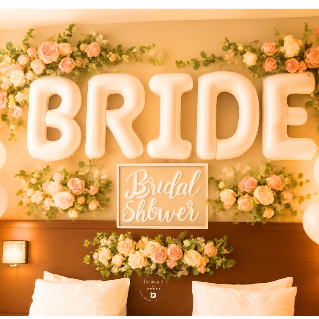 BRIDE balloons with floral arrangements for bridal shower backdrop