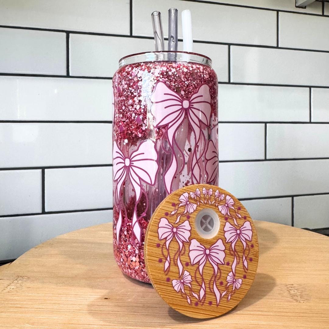 Cold Drink Tumbler Pink Glitter Design Snow Globe Cup Iced Coffee Container Water Juice Holder Girly Aesthetic Drinkware Double Wall Glass Construction Moving Sparkles Feature Bamboo Lid Included Reusable Straw Accessory Birthday Gift Idea