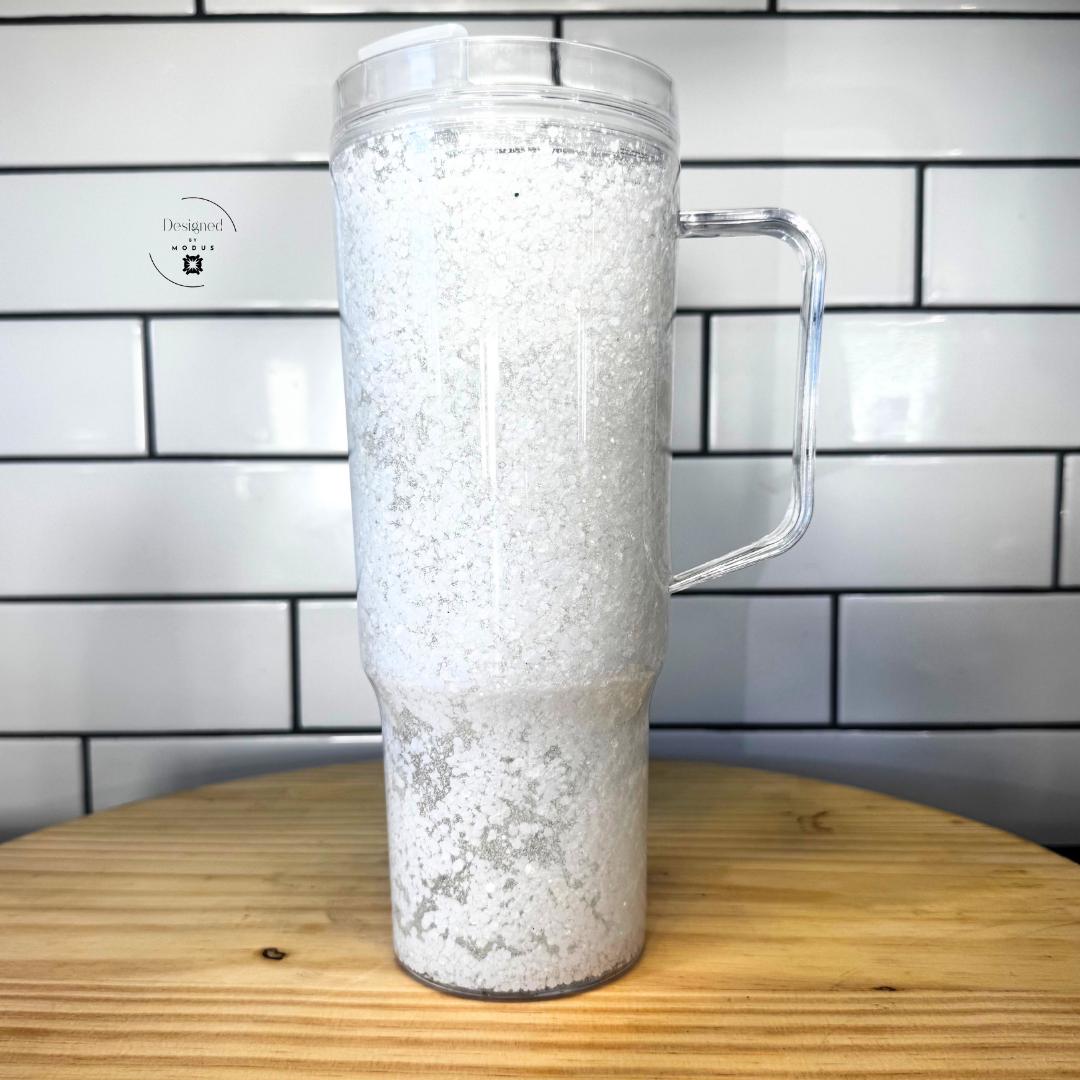 Top-down view showing inside of white glitter tumbler and removable lid