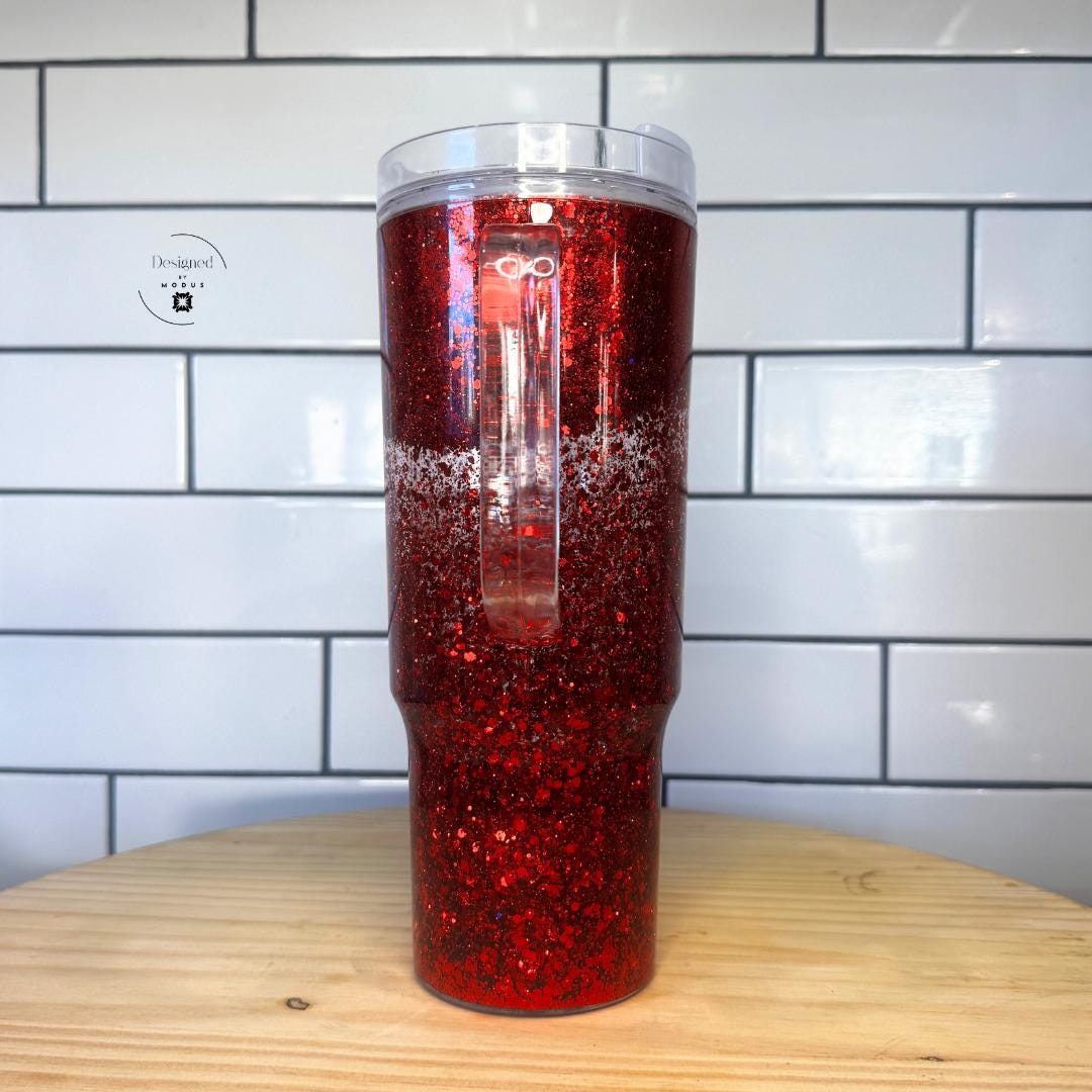 4️⃣ Back view showing clear handle on red sparkle tumbler