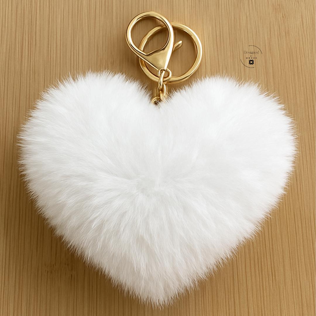 White fuzzy heart bag charm with gold clasp