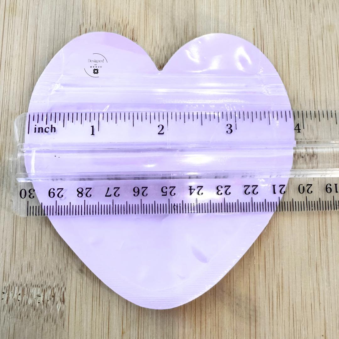 Pastel heart zip pouches  showing size and shape
