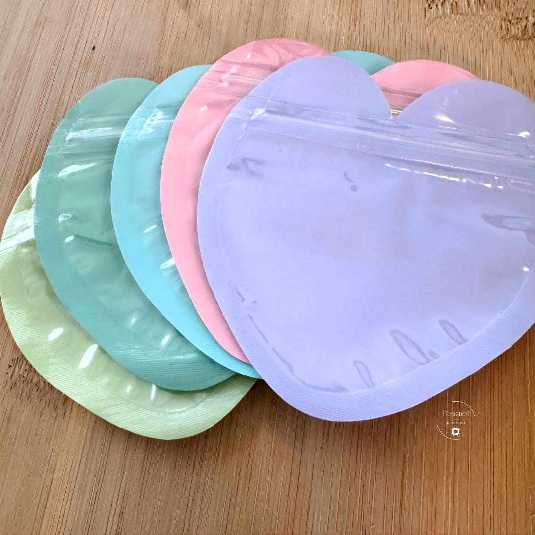 Pastel heart zip pouches  showing size and shape