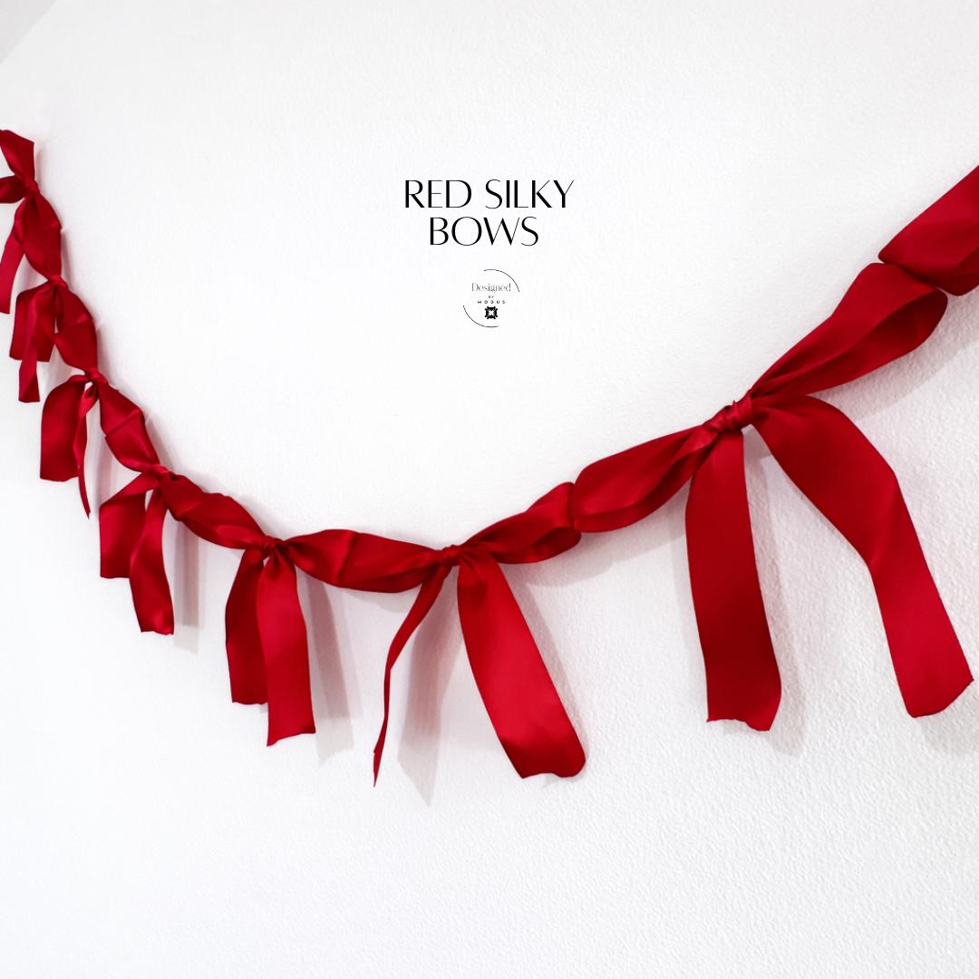Silky red bow garland close up detail-Romantic Red Bow String Valentine Garland Festive Decoration Banner Party Decor Wedding Backdrop Event Styling Silky Ribbon Material Elegant Wall Hanging Heart Themed Display Table Accent Piece Love Celebration Setup Adjustable Length