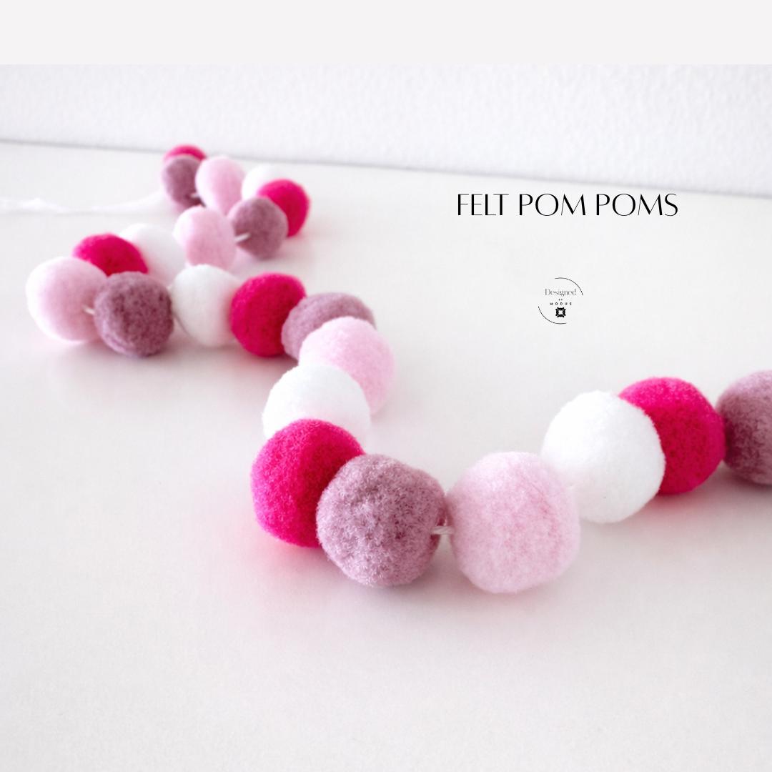 Handmade Wool Felt Ball Garland Hot Pink Light Pink White Pom Pom String Quality Crafted Decoration Nursery Decor Wall Hanging Baby Girl Room Accent Piece Soft Textile Art Playful Colorful Design Modern Home Accessory Lightweight Durable