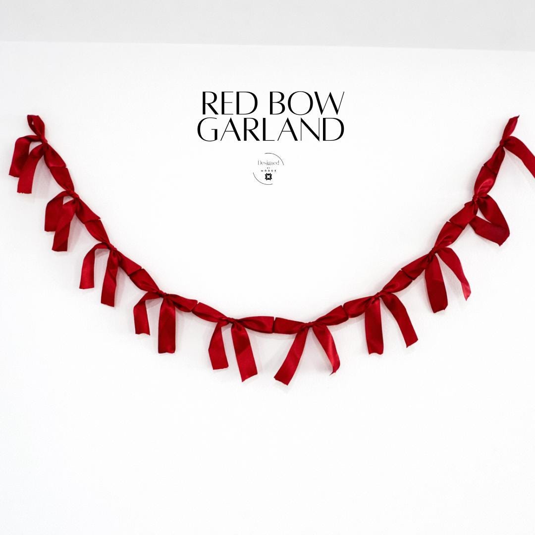 Red bow garland hanging on white wall-Red Bow Garland Valentine Decoration Banner Romantic Party Decor Silky Ribbon Elegant Event Backdrop Wedding String Wall Hanging Festive Table Accent Heart Themed Celebration Love Day Decorative Element Adjustable Length Design Mantel