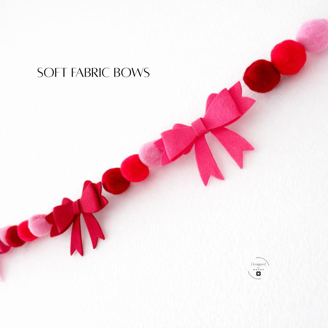 Pink and red pom pom garland strung across wall holiday decor-Pink Valentine Decoration Felt Heart Garland Bow Banner Wall Hanging Display Mantel Decor Holiday Party Backdrop Playroom Decoration Classroom Wall Accent Fluffy Design Collection Romantic Festive Banner Decorative String Display Cute