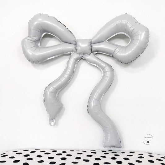 Silver Bow Balloon Wedding Display Giant Foil Design Elegant Celebration Centerpiece Metallic Ribbon Shape Party Decoration Classic Bow Style Anniversary Event Decor Bridal Shower Accessory Special Occasion Setup Festive Background Element