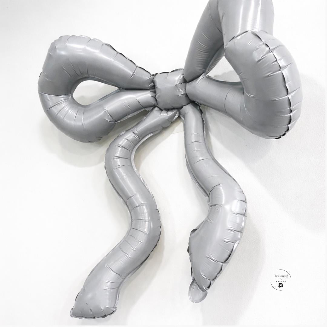 Giant Silver Balloon Bow Design Metallic Foil Material Elegant Party Decoration Large 32 Inch Size Classic Ribbon Shape Celebration Centerpiece Shiny Reflective Surface Premium Quality Construction Impressive Display Element Festive Event