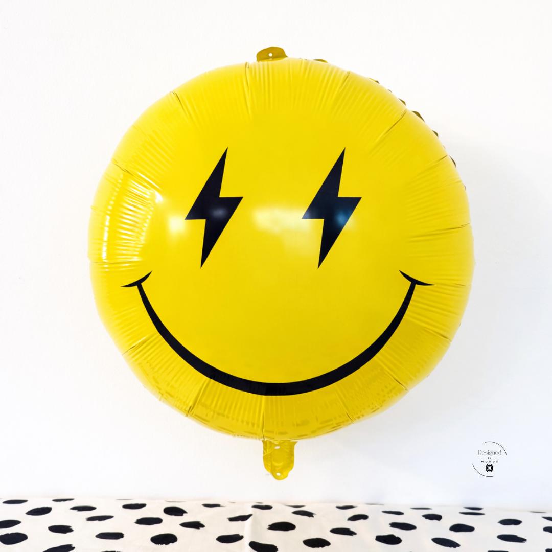 Yellow Smiley Balloon Mylar Foil Material Emoji Style Face Happy Expression Lightning Eyes Design Birthday Party Decoration Celebration Supplies Large Round Eighteen Inch Size Festive Event Decor Room Accent Photo Prop Background Element