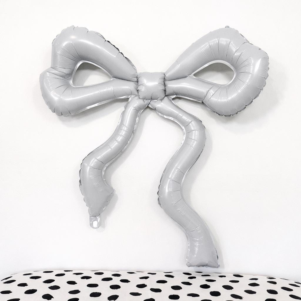 Silver Foil Bow Photo Backdrop Giant Balloon Decoration Wedding Photography Prop Metallic Ribbon Design Event Background Element Birthday Picture Setup Celebration Photography Accessory Elegant Display Item Party Decor Piece Special