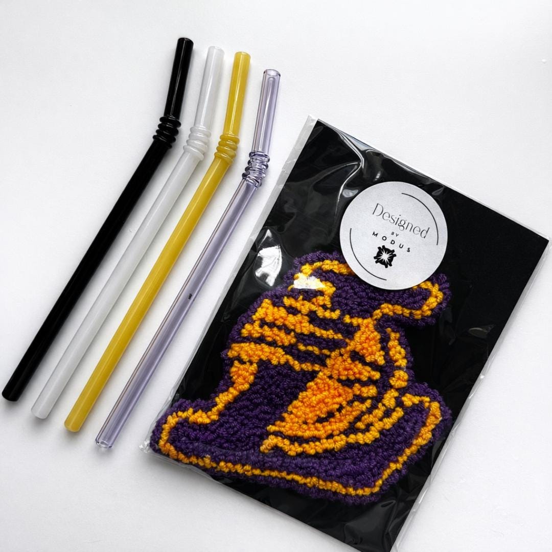 Handmade Mug Rug Basketball Theme Purple Gold Cotton Yarn Crochet Coaster Sports Fan Gift Coffee Table Drink Mat Protection Textured Looped Pile Surface Office Desk Accessory Team Color Design Basketball Shape Curved Lines Border Quality