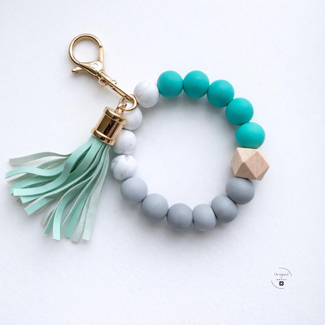 Wrist Key Holder Strap Beaded Keychain Bracelet Women Everyday Fashion Accessory Handsfree Shopping Essential Convenient Carrying Solution Silicone Marble Wooden Bead Construction Faux Leather Tassel Charm Detail Gold Keyring Clasp