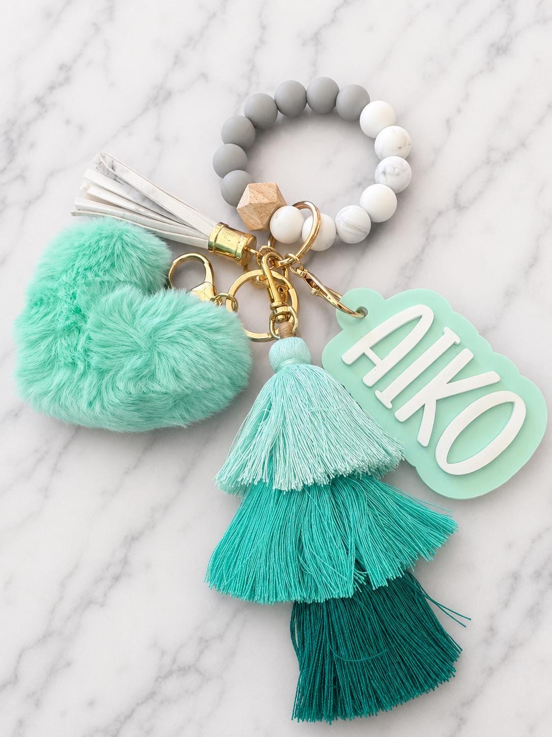 Personalized Name Tag Holder Beaded Wristlet Keychain Custom Gift Women Accessory Marble Pattern Silicone Beads Gray White Design Mint Green Pom Pom White Leather Tassel Ombre Tassel Details Gold Hardware Key Ring Holder Teacher