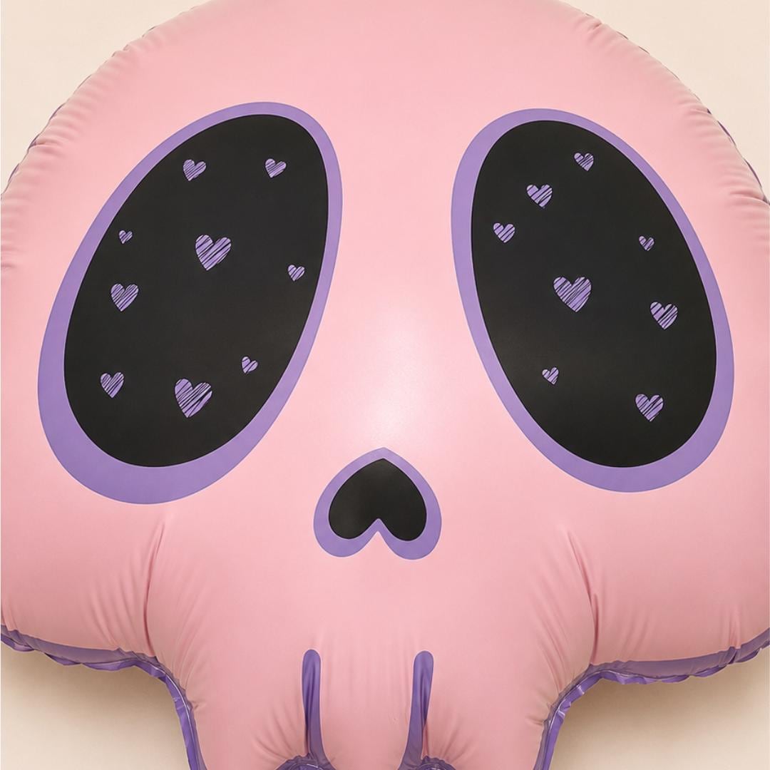 Birthday Party Balloon Kawaii Skull Shape Pink Gothic Halloween Theme Pastel Anime Heart Design Scalloped Edge Foil Mylar Inflatable Nine Inch Size Heart Eye Socket Details Heart Shaped Nose Purple Black Pink Color Gothic Celebration Supply