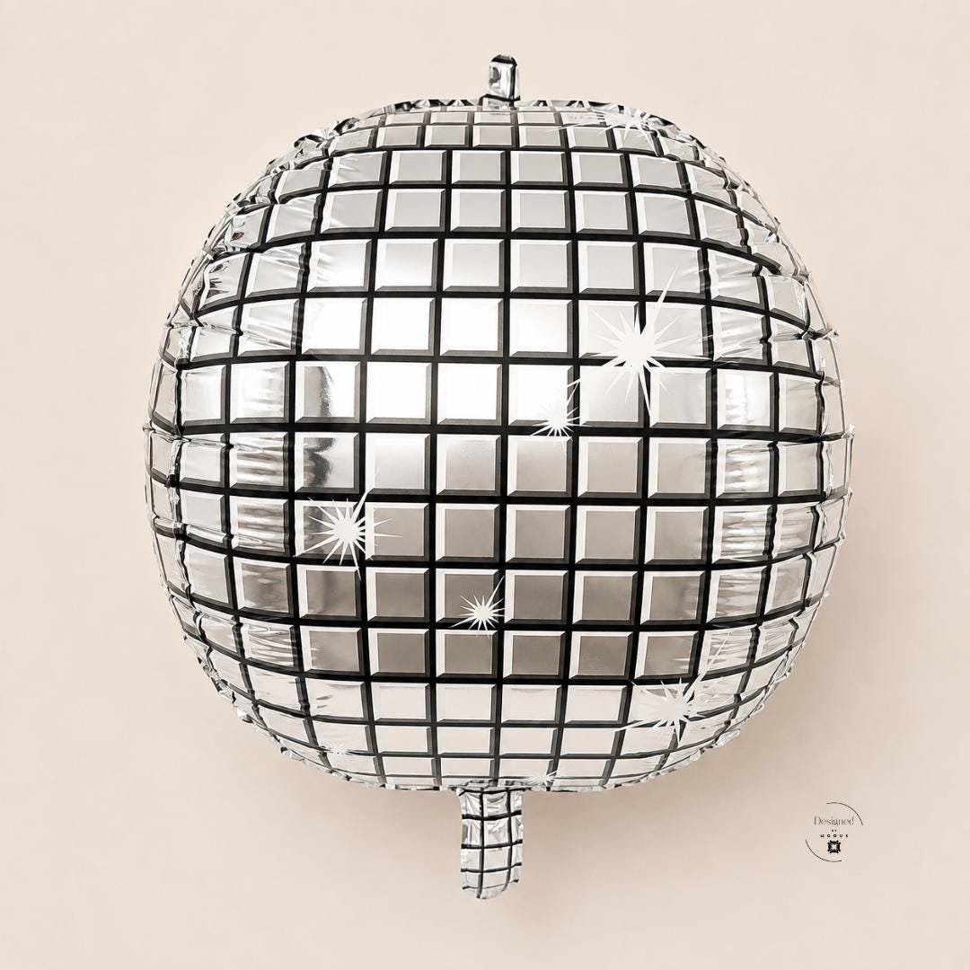 Disco Ball Balloon Party Supply Birthday Celebration Dance Event Nineteen Inch Silver Foil Mylar Inflatable Mirror Sphere Design Retro Theme Seventies Party Atmosphere Shiny Metallic Surface Reflective Pattern Black Grid Lines Groovy