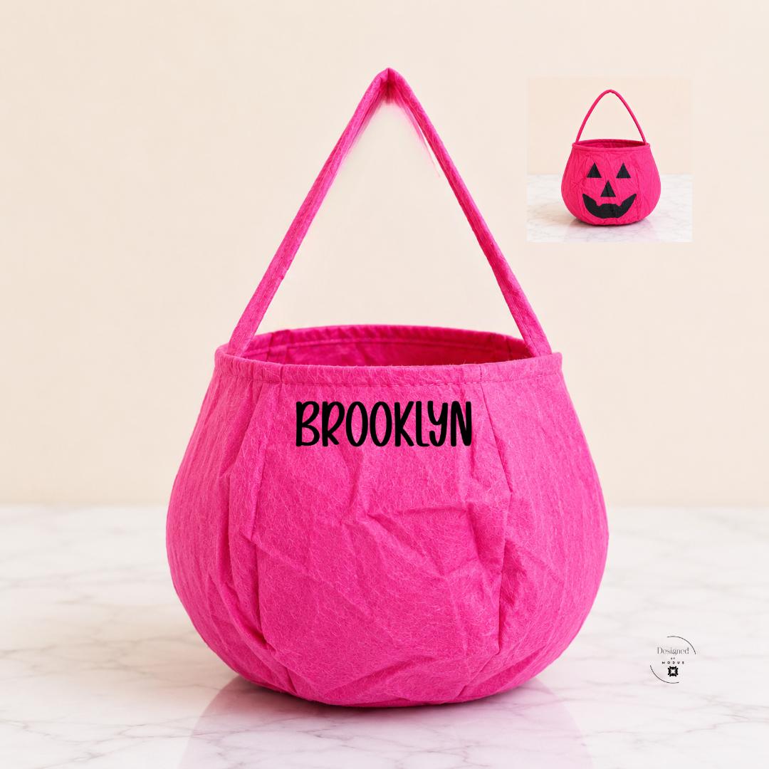 Custom Halloween trick or treat tote for boys and girls with personalized name and choice of colorful pumpkin bag