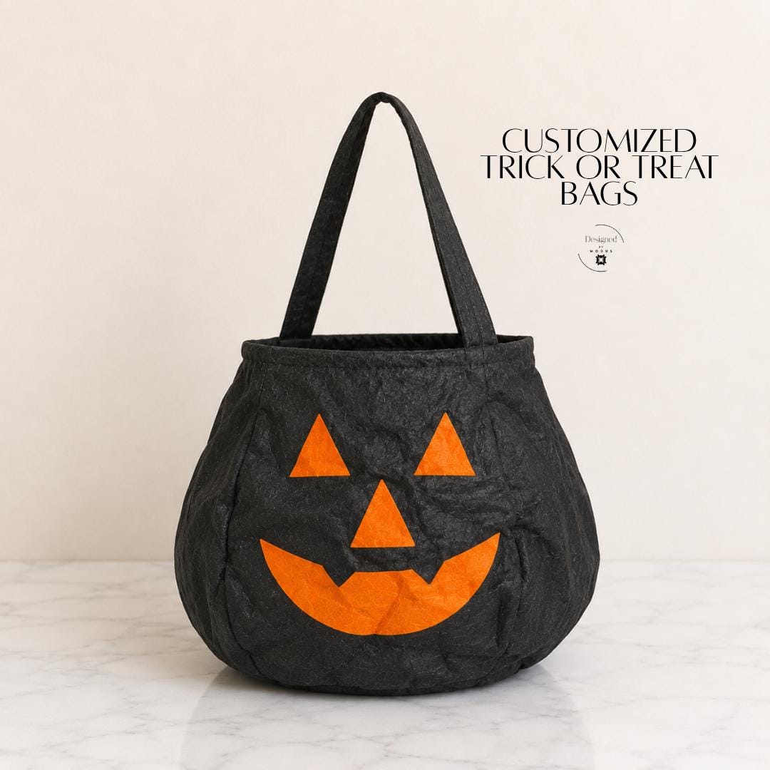 Personalized Halloween trick or treat bag with custom child name and pumpkin jack o lantern face for Halloween candy collecting