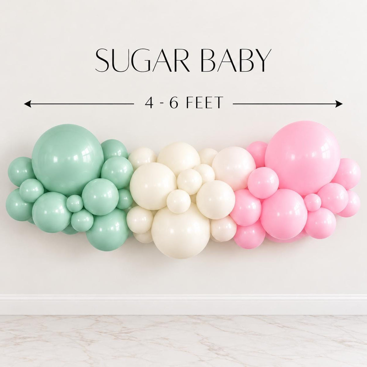 Pastel Christmas balloon garland with mint green, creamy white and baby pink balloons arranged in an organic balloon arch. Soft holiday party decor for pink Christmas themes, Candyland celebrations, Christmas birthdays, winter wonderland parties, kids Christmas events, holiday brunches and festive photo backdrops.