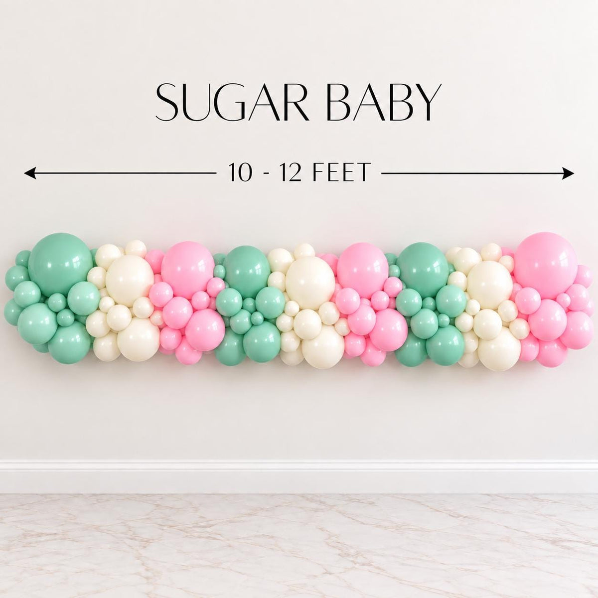 Pink mint green and white Christmas balloon garland kit for pastel holiday party decorations. Multiple balloon sizes create a full organic style balloon arch for Christmas celebrations, winter wonderland parties, holiday birthdays, Christmas brunches, kids parties, dessert tables and festive seasonal photo areas.