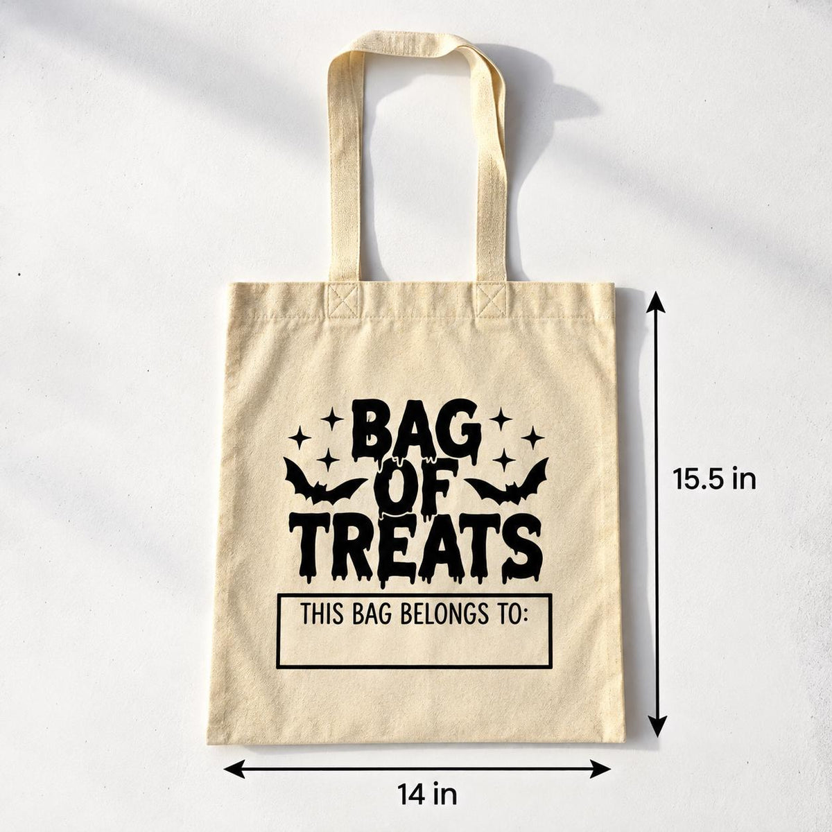 Custom name Halloween candy tote for kids featuring a personalized design for trick or treating. Reusable cotton Halloween bag is available in black, natural or white and provides plenty of Halloween style for collecting treats. Perfect for trick or treat night, trunk or treat events, Halloween parties, classroom celebrations and personalized spooky season gifts for children.