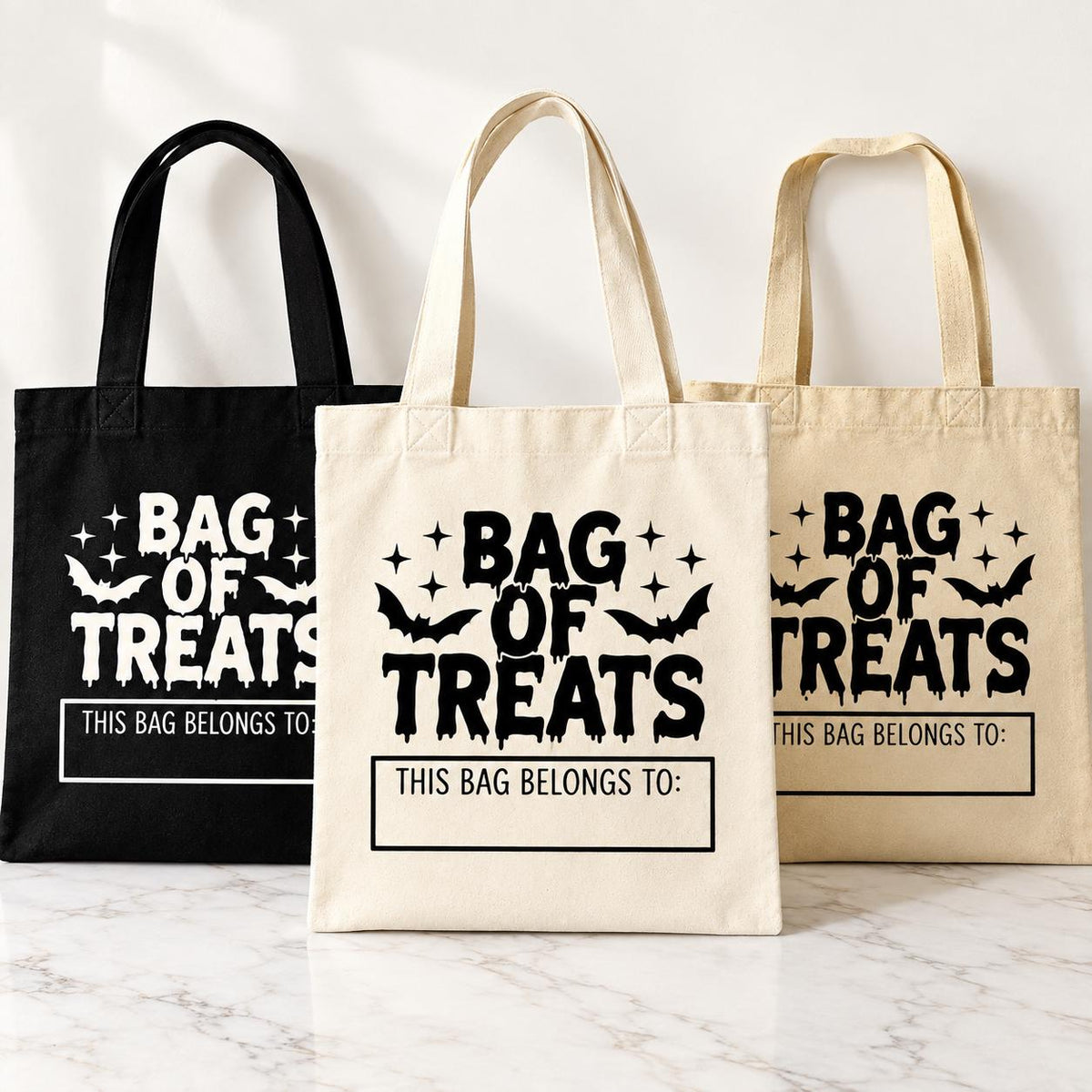 Kids personalized trick or treat tote bag for Halloween candy collecting. Custom name Halloween bag is a fun alternative to disposable candy buckets and can be used for neighborhood trick or treating, Halloween parties, classroom celebrations and fall events. Cotton Halloween tote available in multiple colors with personalized lettering for a special spooky season accessory.