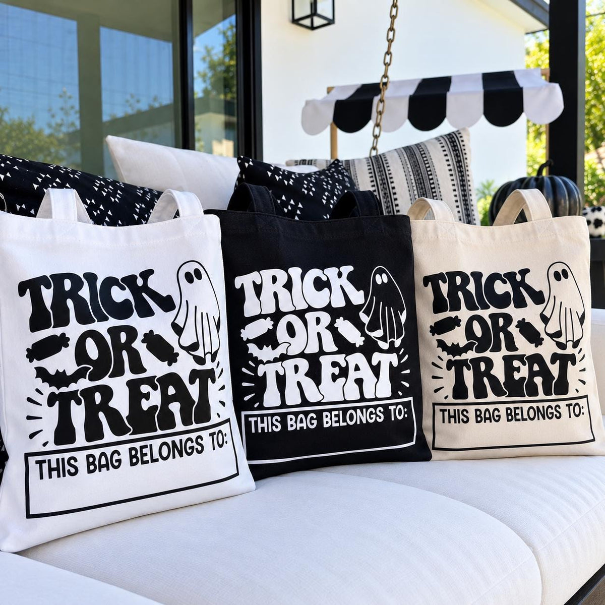 Personalized Halloween trick or treat bag featuring a cute trick or treating ghost design and custom child’s name. This cotton Halloween candy tote is perfect for kids collecting treats on Halloween night, trunk or treat events, school parties and fall festivals. A reusable custom Halloween bag and fun personalized Halloween gift for boys and girls.