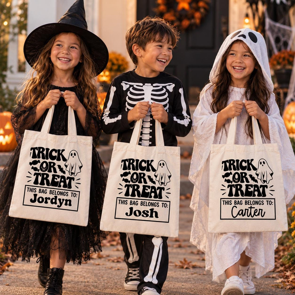 Halloween candy tote with trick or treating ghost design and personalized child’s name. Choose a black, natural or white cotton bag to create a custom trick or treat bag for Halloween night. Perfect for kids collecting candy, attending trunk or treat, Halloween parties, school celebrations and fall festivals. Personalized Halloween tote makes a cute spooky season gift.