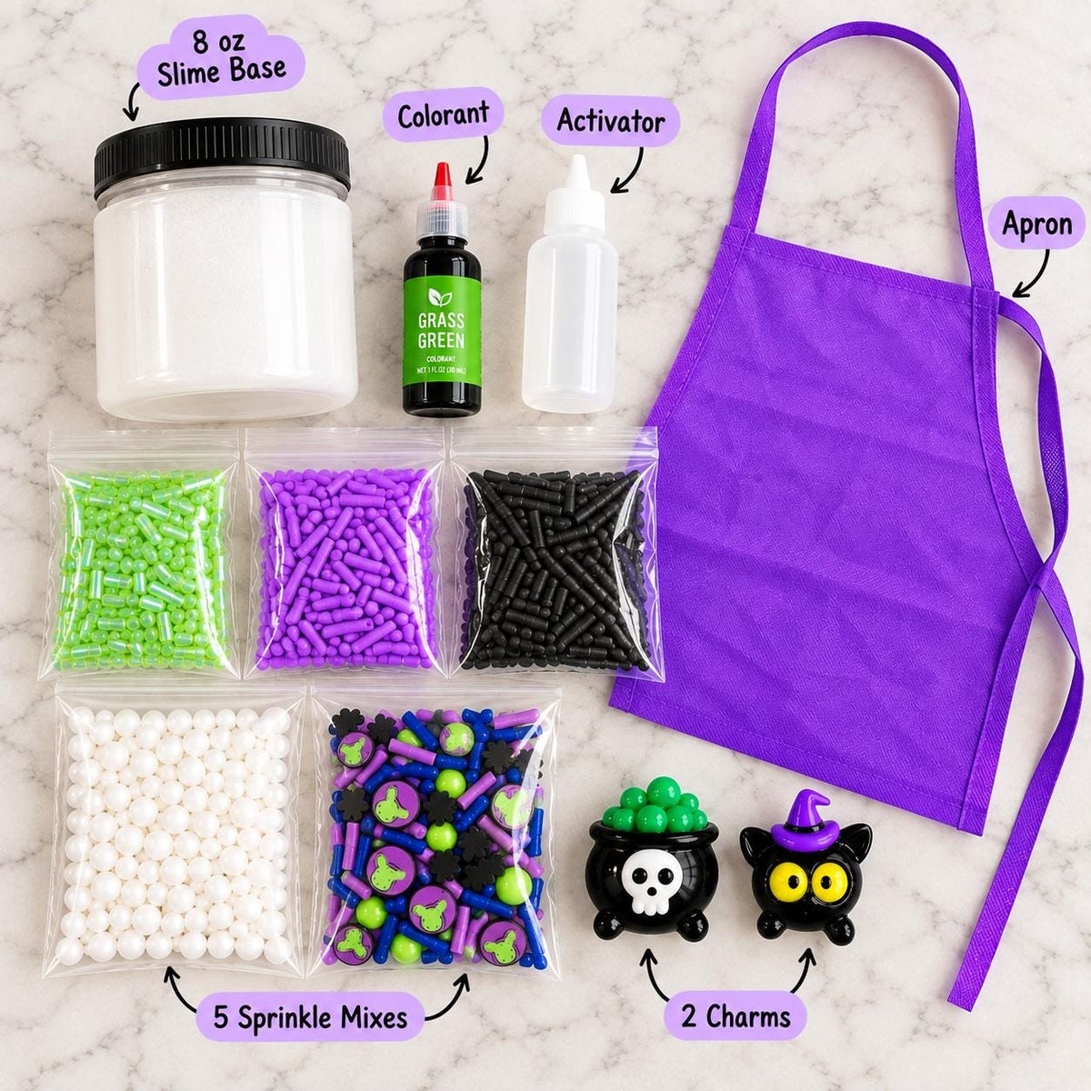 Halloween slime kit for kids featuring premade white slime, green slime dye, Halloween sprinkles, witch and black cat charms, apron and slime activator. Customizable DIY slime making kit for Halloween parties, spooky birthday parties, classroom celebrations, playdates, party favors, sensory activities and kids crafts. Fun Halloween activity for girls and boys, classroom party favor, birthday activity and creative sensory play kit.