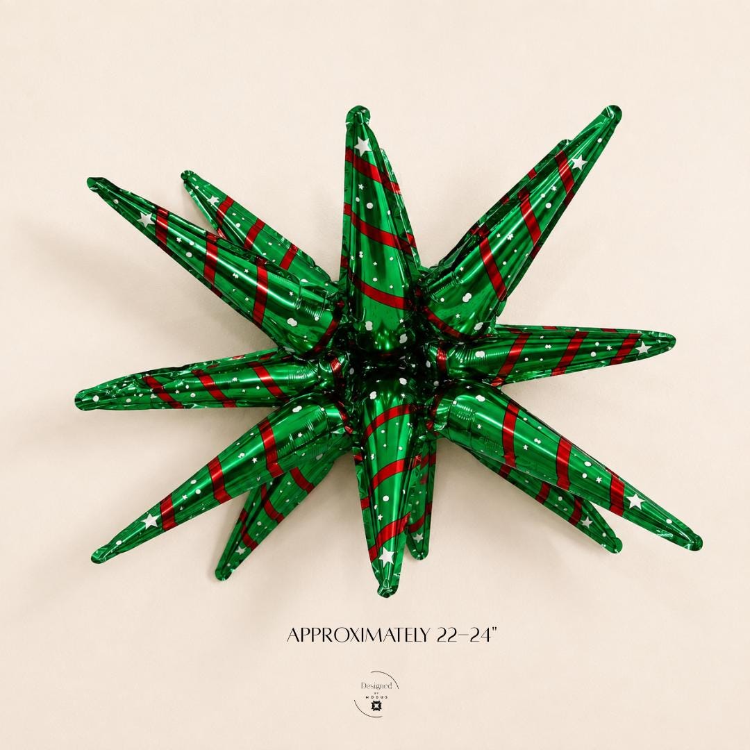 Christmas starburst foil balloon featuring shiny metallic green pointed sections decorated with red stripes and small white holiday accents. Dimensional Christmas balloon for festive party decorations, DIY Christmas balloon garlands, holiday balloon arches, Santa themed celebrations, winter parties, Christmas dessert table backdrops, classroom holiday decorations and seasonal home displays.