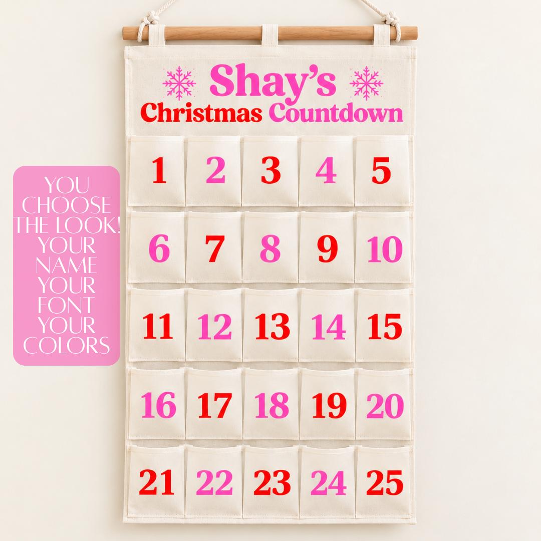 Personalized Christmas advent calendar featuring 25 numbered fabric pockets, custom child's name and 24 colorful miniature squishy toys included. Hanging cream Christmas countdown calendar with wooden rod and red green or pink red lettering options. Reusable Christmas advent gift for kids ages 5 and up, personalized holiday countdown, sensory toy Christmas gift, Christmas bedroom decoration and family holiday tradition with 24 daily squishy surprises.