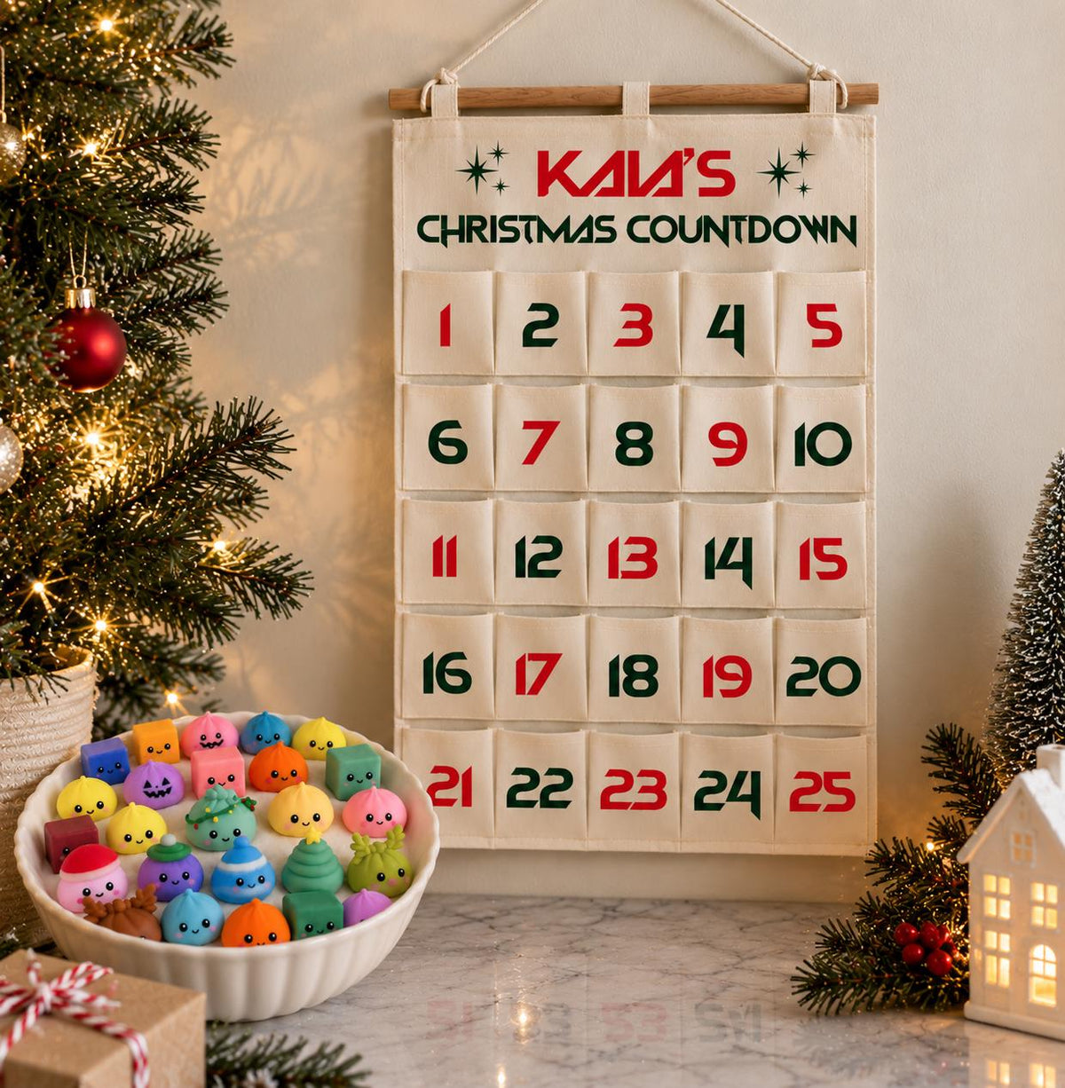 Custom Christmas advent calendar featuring five font styles and two holiday color combinations, traditional red and green or playful pink and red. Personalized child's name printed above Christmas Countdown with 25 numbered fabric pockets. Includes 24 miniature squishy toys for daily holiday surprises. Kids Christmas gift for ages 5 and up, personalized advent calendar, reusable Christmas countdown, sensory toy gift and holiday bedroom decoration.